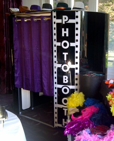 Black Photo Booth for hire Curtains can be in either black red silver